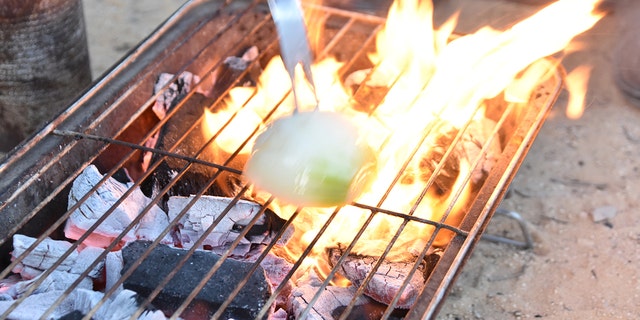 This simple grilling hack makes use of the antibacterial properties of an onion.