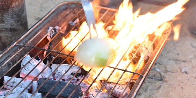 This simple grilling hack makes use of the antibacterial properties of an onion.