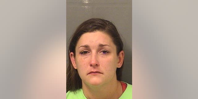 Police allegedly found Colleen Nichols, 30, unconscious in her van.