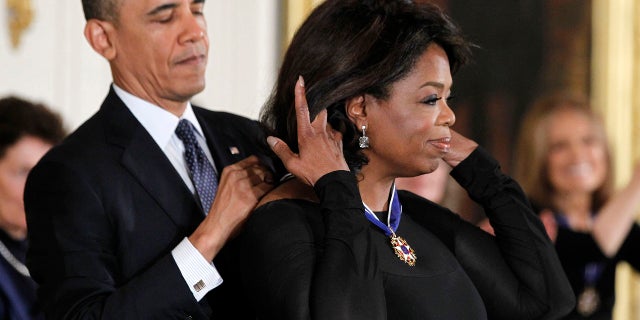 President Barack Obama with Oprah Winfrey.