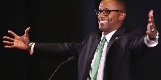 New University of Oregon NCAA college football coach Willie Taggart jokes with the audience during an introductory press conference in Eugene, Ore., Thursday Dec. 8, 2016. (Chris Pietsch/The Register-Guard via AP)