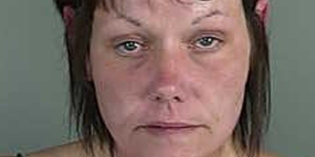 Lorrie Hacker has several tattoos on her wrist and chest.