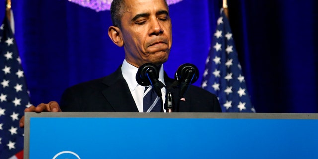 U.S. President Barack Obama pauses while delivering remarks on the Affordable Care Act, commonly known as Obamacare, at an Organizing for Action grassroots supporter event in Washington earlier this month.