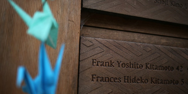 File photo: Origami cranes hang near names of some of the 227 men, women and children who were marched off the island to camps in 1942, at the Japanese American Exclusion Memorial on Puget Sound's Bainbridge Island, Washington, U.S. February 12, 2017. (REUTERS/Chris Helgren)