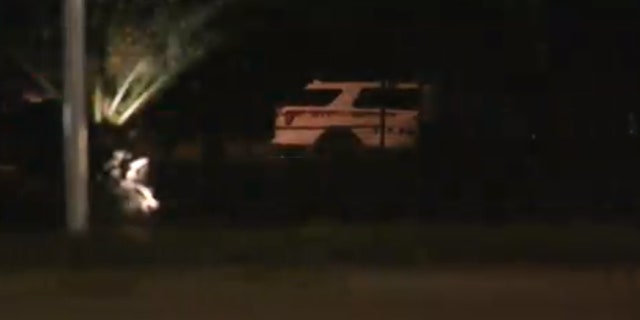 An Orlando police officer was shot after the shooter opened fire, then took four children hostage, police said.