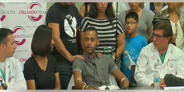 Orlando shooting victim Angel Colon addresses reporters Tuesday.