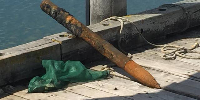 The fishermen found the missile while searching for clams, Lt. Higgins said.