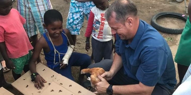 The team donated 40 chickens and several milking goats to ensure a sustainable food source for the children.