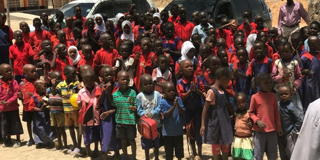 Children at a local secondary school receive 400 pairs of shoes from donors in Virginia, so they no longer have to walk 10 miles a day over thorny, lava rocks to get to school.