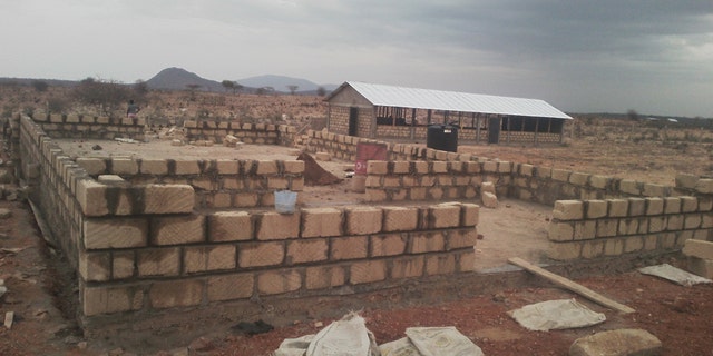 Building the new children's home dorm in Archer’s Post, Kenya.