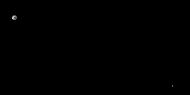 This black-and-white image of the Earth-moon system was captured on Sept. 25, 2017 by OSIRIS-REx's NavCam 1. At the time this image was taken, the spacecraft was 804,000 miles (1,297,000 kilometers) from Earth and 735,000 miles (1,185,000 km) from the moon.