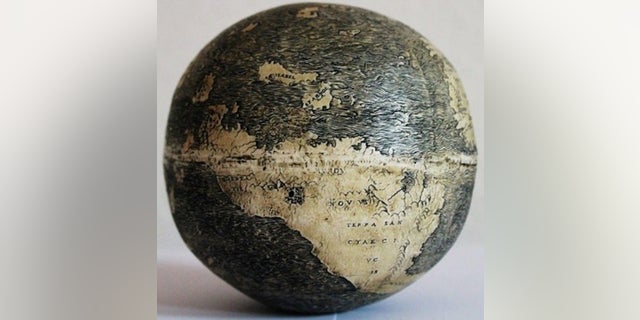 The New World on the ostrich egg globe, which bears three names: "TERRA DE BRAZIL," "MVNDVS NOVVS, and "TERRA SANCTAE CRVCIS."