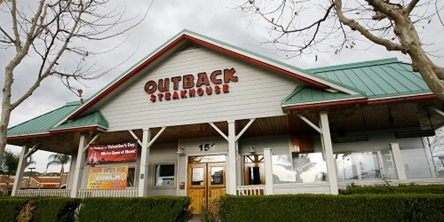 Outback Steakhouse fired Tamlynn Yoder for violating their social media policy.