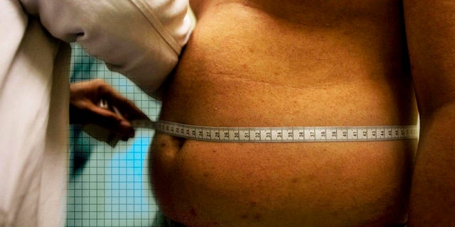 ** ADVANCE FOR SUNDAY, SEPT. 28 ** Angel Moreno, 14, who weighs 71.5 kg, or 156.528 lb, gets a check-up at Mexico's Children's Hospital in Mexico City, Friday, Aug. 29, 2008. Mexico is on track to surpass the United States as one of the world's fattest countries by 2018. Nearly half of Mexico's 110 million people already are overweight, while the number of fat children has climbed 8 percent a year in the last decade. (AP Photo/Alexandre Meneghini)