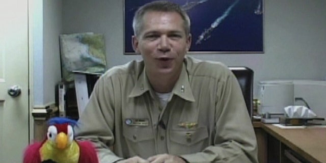 FILE: Capt. Owen Honors of the USS Enterprise aircraft carrier is pictured in an unidentified location in this still image taken from a video.