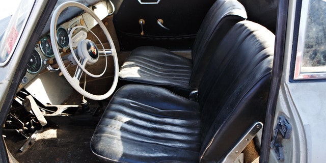 The car has its original leatherette upholstery and 52,837 miles on its odometer.