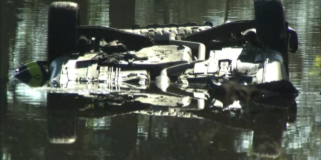 Three suspected burglars died after their car went into a pond during a police chase in Clayton County on Monday. (Fox 5 Atlanta)