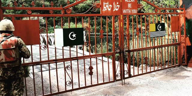 At the gates on the Pakistan side of the Indian border in Jammu and Kashmir, known as the "Line of Control" (LOC)
