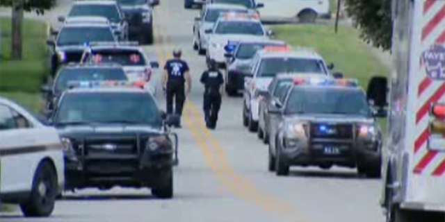 The coroner also reported to the scene, according to a Fayette County official who spoke to The Associated Press.