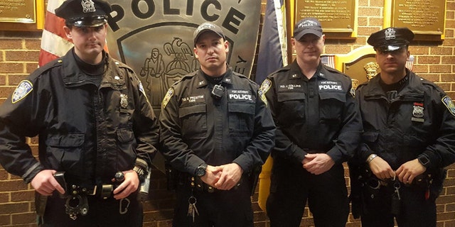 Port Authority Police officers Sean Gallagher, left, Drew Preston, Jack Collins, and Anthony Manfredini.