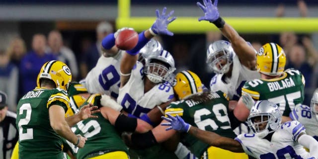 Jan 15, 2017; Arlington, TX, USA; Green Bay Packers kicker Mason Crosby (2) kicks the game winning field goal against the Dallas Cowboys in the NFC Divisional playoff game at AT&T Stadium. Mandatory Credit: Dan Powers/The Post-Crescant via USA TODAY NETWORK