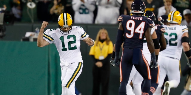 Green Bay Packers' Aaron Rodgers celebrates a touchdown pass during the first half of an NFL football game against the Chicago Bears Thursday, Sept. 28, 2017, in Green Bay, Wis. (AP Photo/Matt Ludtke)
