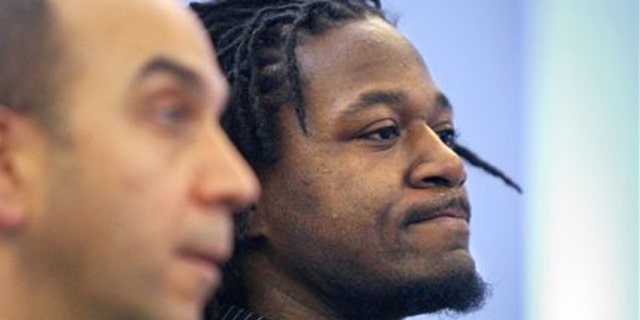 Jan. 18, 2012: Cincinnati Bengals cornerback Adam "Pacman" Jones, right, appears in Hamilton County Municipal Court in Cincinnati with his lawyer, Ed Perry.