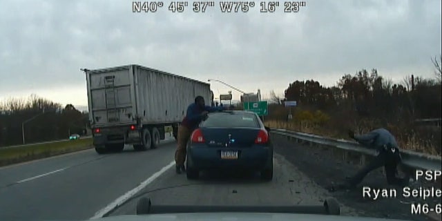 Daniel Clary can be seen opening fire on two Pennsylvania state police troopers on Nov. 7, 2017.