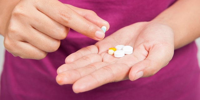 pills in hand