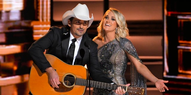 Country music stars Brad Paisley and Carrie Underwood in 2016. Paisley and Underwood will host the Nov. 8 award show.