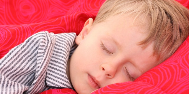 Help kids fall asleep at night by sticking to a routine and creating a good sleeping environment - and follow other smart tips shared here.