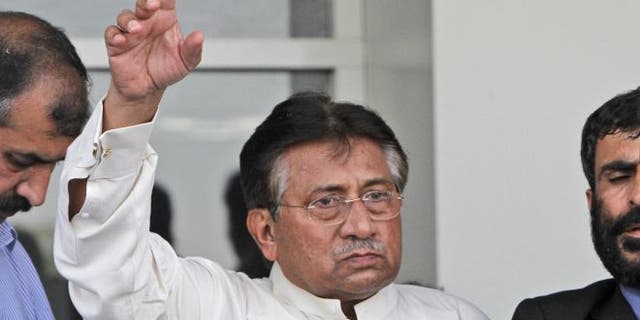 March 24, 2013: Former Pakistani President Pervez Musharraf, gestures upon his arrival to Karachi airport, Pakista.