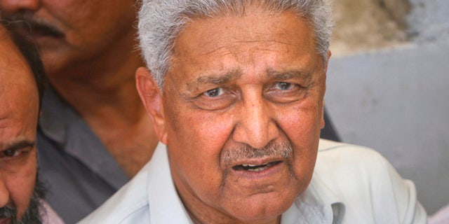 May 8, 2011: Pakistani nuclear scientist Abdul Qadeer Khan is photographed after a silent prayer over the grave of his brother Abdul Rauf Khan, during funeral services in Karachi. (Reuters)