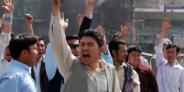 March 29, 2012: Pakistani protesters shout slogans against government to condemn killings in Quetta, Pakistan after an attack by a gunman who appeared to target local employees of the United Nations Food and Agriculture Organization, officials said.