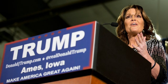Jan. 19, 2016: Former Alaska Gov. Sarah Palin, left, endorses Republican presidential candidate Donald Trump during a rally at Iowa State University in Ames. (AP Photo/Mary Altaffer)