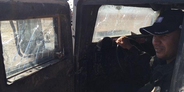 Iraqi Special Force soldier Mohammed recounted how bullets struck hthe window of his Humvee.