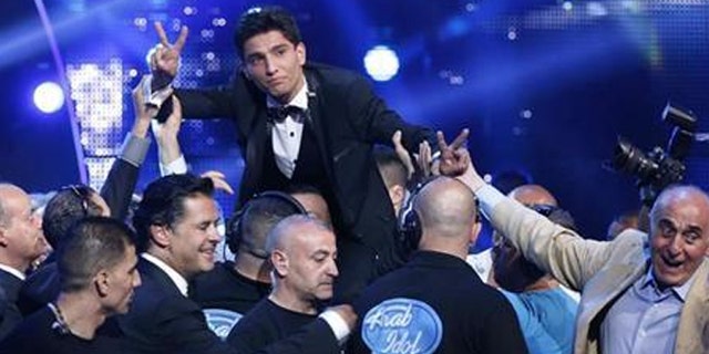 Muhammed Assaf, a resident of Gaza who won the 2013 "Arab Idol" TV show, has a hit song out celebrating the "martyrs" who kill Jews. (Reuters)