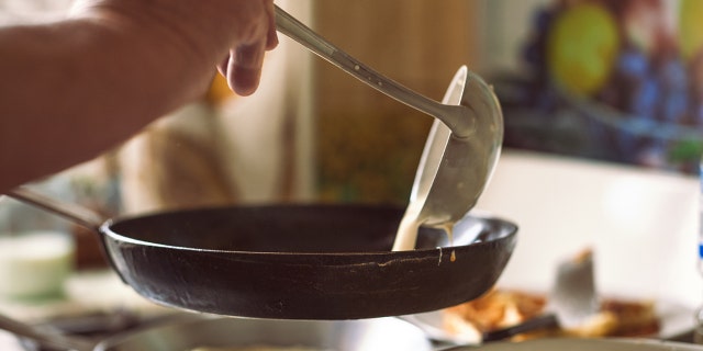 If you don't own a two-burner griddle apparatus, a heavy iron skillet is your next best bet.