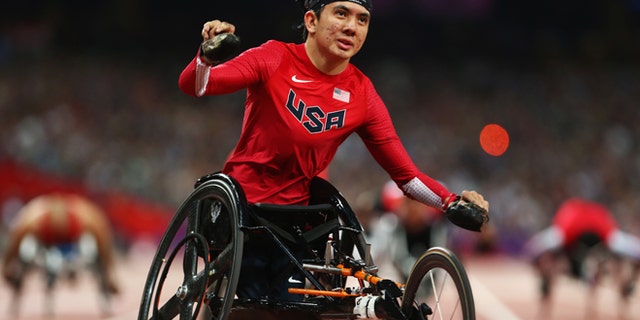 LONDON, ENGLAND - SEPTEMBER 08: Raymond Martin of the United States celebrates as he wins gold in the Men's 200m T52 Final on day 10 of the London 2012 Paralympic Games at Olympic Stadium on September 8, 2012 in London, England. (Photo by Michael Steele/Getty Images)