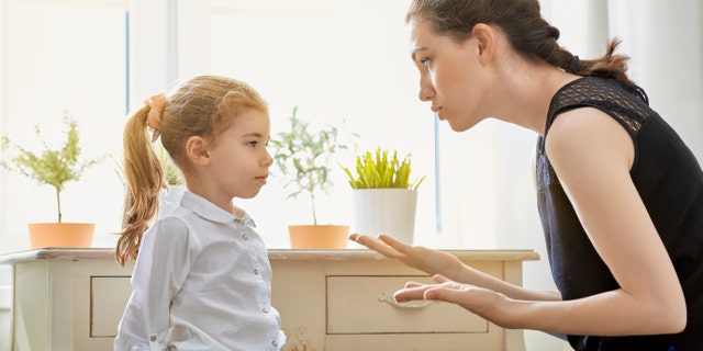 mother scolds her child