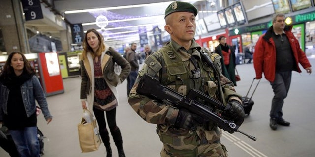As of late Friday evening, Charles de Gaulle Airport remains open and trains are running, although security remains high.