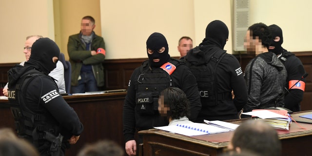 Salah Abdeslam appears in court during his trial in Brussels. He's set to be tried in France, too, for a series of 2015 terror attacks there.