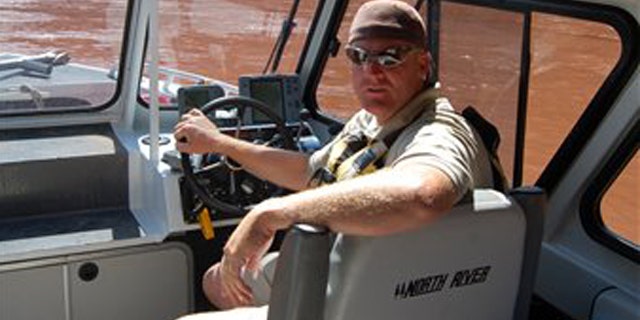 This undated photo provided by Utah State Parks and Recreation, shows Utah State Ranger Brody Young. Nearly 100 officers tracking a gunman in a rugged Utah canyon Saturday, Nov. 20, 2010, were believed to be closing in on the suspect accused of shooting and critically wounding Young.