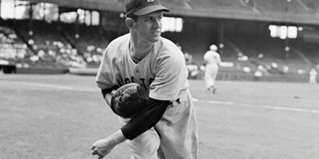 June 9, 1949: In this file photo, Boston Red Sox pitcher Mel Parnell warms up before a game in St. Louis. Parnell, the left-handed pitcher who faced the infamous Green Monster at Fenway Park and some of the best hitters of the 1940s and early 1950s, has died at age 89.