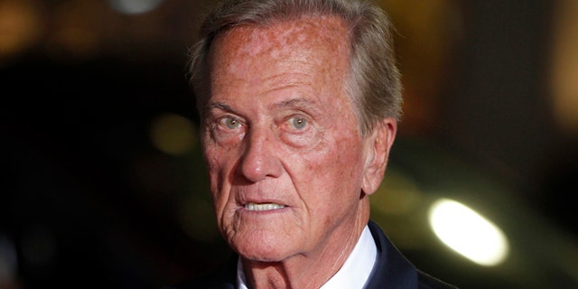 Singer Pat Boone arrives as a guest for a screening in honor of the "West Side Story: 50th Anniversary Edition" Blu-ray release in Hollywood, California November 15, 2011. The film won 10 Academy Awards in 1962, including best supporting actor and actress awards for George Chakiris and Rita Moreno and for best picture. REUTERS/Fred Prouser (UNITED STATES - Tags: ENTERTAINMENT HEADSHOT ANNIVERSARY) - RTR2U2RW