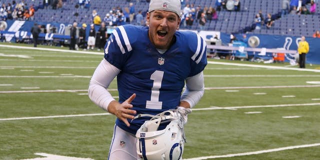 Oct 19, 2014; Indianapolis, IN, USA; Indianapolis Colts punter Pat McAfee (1) runs off the field after a game against the Cincinnati Bengals at Lucas Oil Stadium. Indianapolis defeats Cincinnati 27-0. Mandatory Credit: Brian Spurlock-USA TODAY Sports