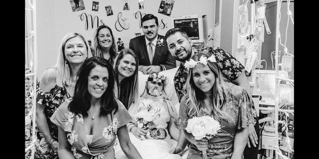 The pair married in front of family, friends and Marino's care team.
