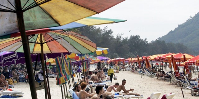 Patong beach is a popular destination for tourists in Thailand.