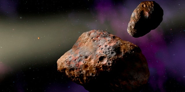 An artist's depiction of the binary asteroid Patroclus-Menoetius.