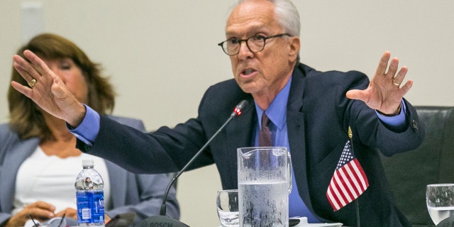 University of California Regent Norman Pattiz, right, addresses fellow board members in Irvine, Calif., Sept. 17, 2015.